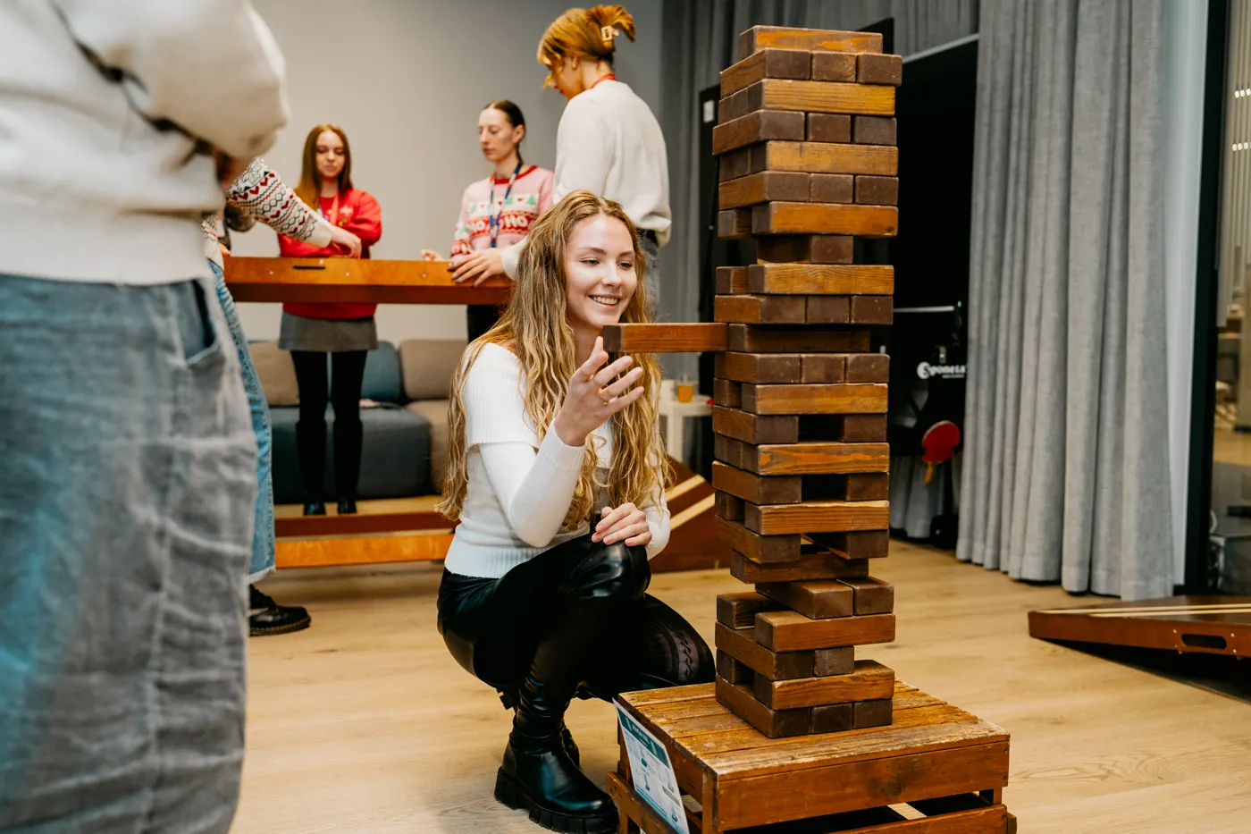 A careful Jenga move at the Christmas gathering