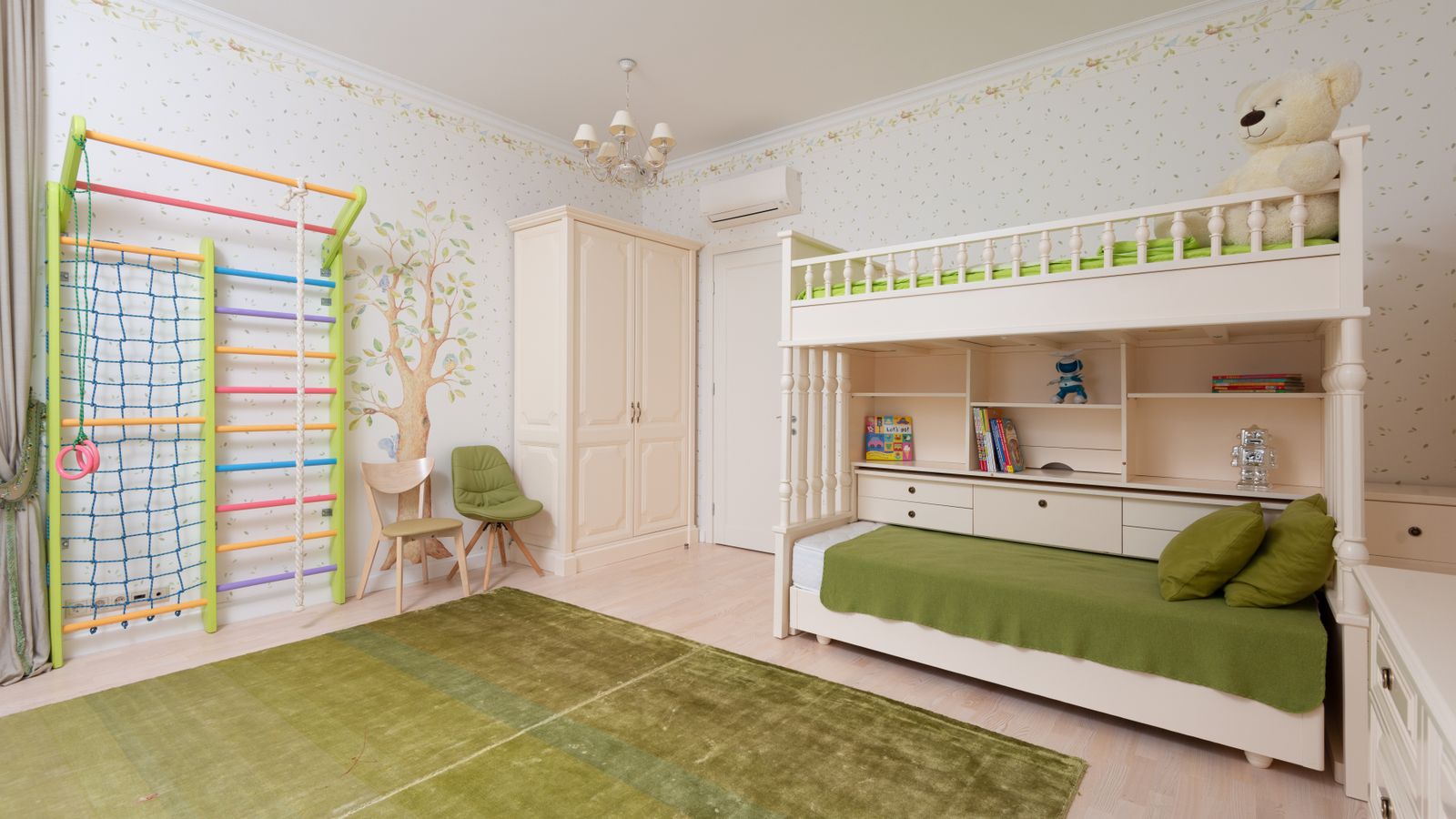A children's room with a bunk bed, wardrobe, and play area