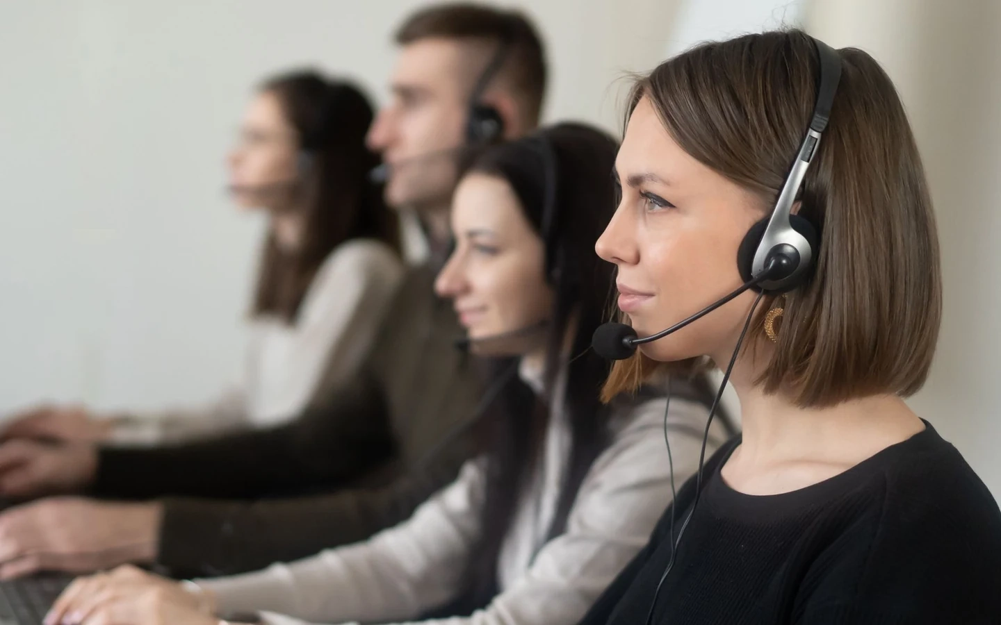 A Bison Commerce customer support agent wearing a headset